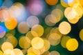 Shimmering abstract colored circles defocused christmas lights background. Blurred fairy lights. Out of focus holiday background Royalty Free Stock Photo