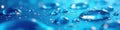 Shimmering blue water droplets on smooth surface, shiny, surface Royalty Free Stock Photo