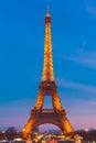 Shimmering Eiffel Tower at night in Paris, France Royalty Free Stock Photo