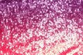 Shimmering festive background texture of shiny pink defocus