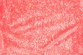 Shimmering festive background texture of shiny coral
