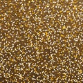 1192 Shimmering Gold Confetti: A festive and glamorous background featuring shimmering gold confetti in luxurious and sparkling