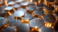 Shimmering gold hexagonal patterns reflect light, creating a dynamic visual texture in a captivating close-up view Royalty Free Stock Photo