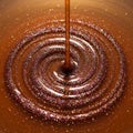Shimmering liquid forms concentric circles as it pours smoothly, resembling rich Royalty Free Stock Photo