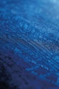 Shimmering pixel triangles on deep blue gradient, forming captivating geometric pattern