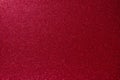 Shimmering ruby red glitter background evenly focused, countless sparkles create radiant abstract depth with vibrant luminous Royalty Free Stock Photo