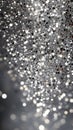 Shimmering silver Christmas particles and sprinkles perfect for festive occasions like Christmas and New Year. Vertical