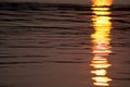 Shimmering sunset on Canobie Lake water.