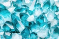 Shimmering turquoise crystals reflecting light in a close-up view, creating an abstract and elegant texture for minimalistic Royalty Free Stock Photo