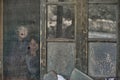 Shimshal high school children look through the wire mesh and pieces of cardboard