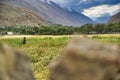 In Shimshal village, children play among the houses and the small and insufficient wheat crops grown among the houses