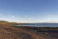 The Shingle and rocky beach seen beside the coastal footpath between Johnshaven and Inverbervie Royalty Free Stock Photo