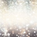 Shining blurred warm silver bokeh background with glitters and lights. Glowing silver white holiday banner for christmas, new year