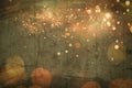 Shining christmas gold lights, bokeh particles on wooden vintage background, club party holiday copy space. Royalty Free Stock Photo