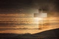 Shining cross on Calvary hill, sunrise, sunset sky background. Copy space. Ascension day concept. Christian Easter