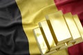 Shining golden bullions on the belgium flag Royalty Free Stock Photo