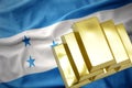 Shining golden bullions on the honduras flag