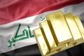 Shining golden bullions on the iraq flag Royalty Free Stock Photo