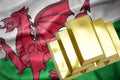 Shining golden bullions on the wales flag Royalty Free Stock Photo