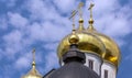 Shining Golden Cupola Of Kremlin In Dmitrov Under Blue Cloudy Sky