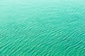 Shining green wavy water surface ripple background Royalty Free Stock Photo