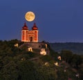 Shining moon.Calvary under the moonlight in the night. Illuminated historical monument. Night photography. Royalty Free Stock Photo