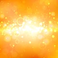 Shining orange background with light effects. Golden burst. Royalty Free Stock Photo