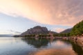 Shining panorama of Lecco Lake at the sunset with huge colorful