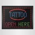 Shining retro light banner tattoo open here on a black background