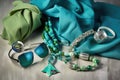 shining silver accessories with beachwear in blue and green shades Royalty Free Stock Photo