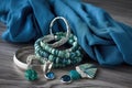 shining silver accessories with beachwear in blue and green shades Royalty Free Stock Photo
