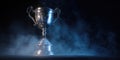 The shining silver trophy surrounded by mist and dramatic lighting. AI generated image Royalty Free Stock Photo
