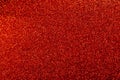 Shining sparkly glittery festive red texture for background. Royalty Free Stock Photo