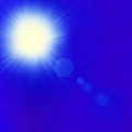 Shining sun at clear blue sky with copy space Royalty Free Stock Photo