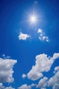 Shining sun at clear blue sky with copy space, Shining sun with rays and clear blue sky, The sun shines bright in the daytime in Royalty Free Stock Photo