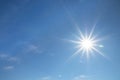 Shining sun at clear blue sky with free text space Royalty Free Stock Photo