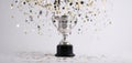 The shining trophy surrounded by sparkling stars and festive decorations. AI generated image Royalty Free Stock Photo