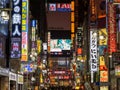 Shinjuku, Japan - 8 9 19: The neon signs of Kabukicho lit up at night in Tokyo Royalty Free Stock Photo