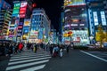 Shinjuku, Tokyo, Japan - December 24, 2018: Crowd pedestrians people walking on crosswalk at Shinjuku district at night in Tokyo,