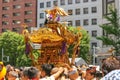 2017 05 28. SHINJUKU TOKYO JAPAN. People are carrying a portable shrine on their shoulders and walking around shinjuku city