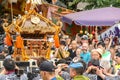 2017 05 28. SHINJUKU TOKYO JAPAN. People are carrying a portable shrine on their shoulders and walking around shinjuku city.