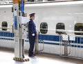 An N700 Shinkansen bullet train at departing a station in Japan Royalty Free Stock Photo