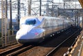 The Shinkansen bullet train arriving at a station in Japan