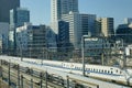 Shinkansen Bullet Train running on track at Tokyo station, Japan Royalty Free Stock Photo