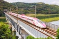 Shinkansen Hello Kitty high-speed train operated by Japan Rail JR West on Sanyo Shinkansen line in Kurashiki, Japan