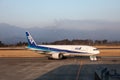 Shinmoedake volcano erupts as plane sits on tarmac