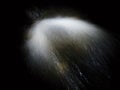 Shinning drops. Cascade of small weir on mountain stream, water is running over blocks Royalty Free Stock Photo