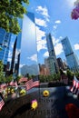 Shinning sun reflecting on the buildings surrounding the National September 11 Memorial and Museum built in 2006.