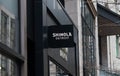 Shinola Detroit logo and storefront in River North, downtown Chicago area.