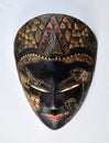 Shinta Face Mask. Wooden Decorated Traditional Asian Face Mask. Front view, on the white background